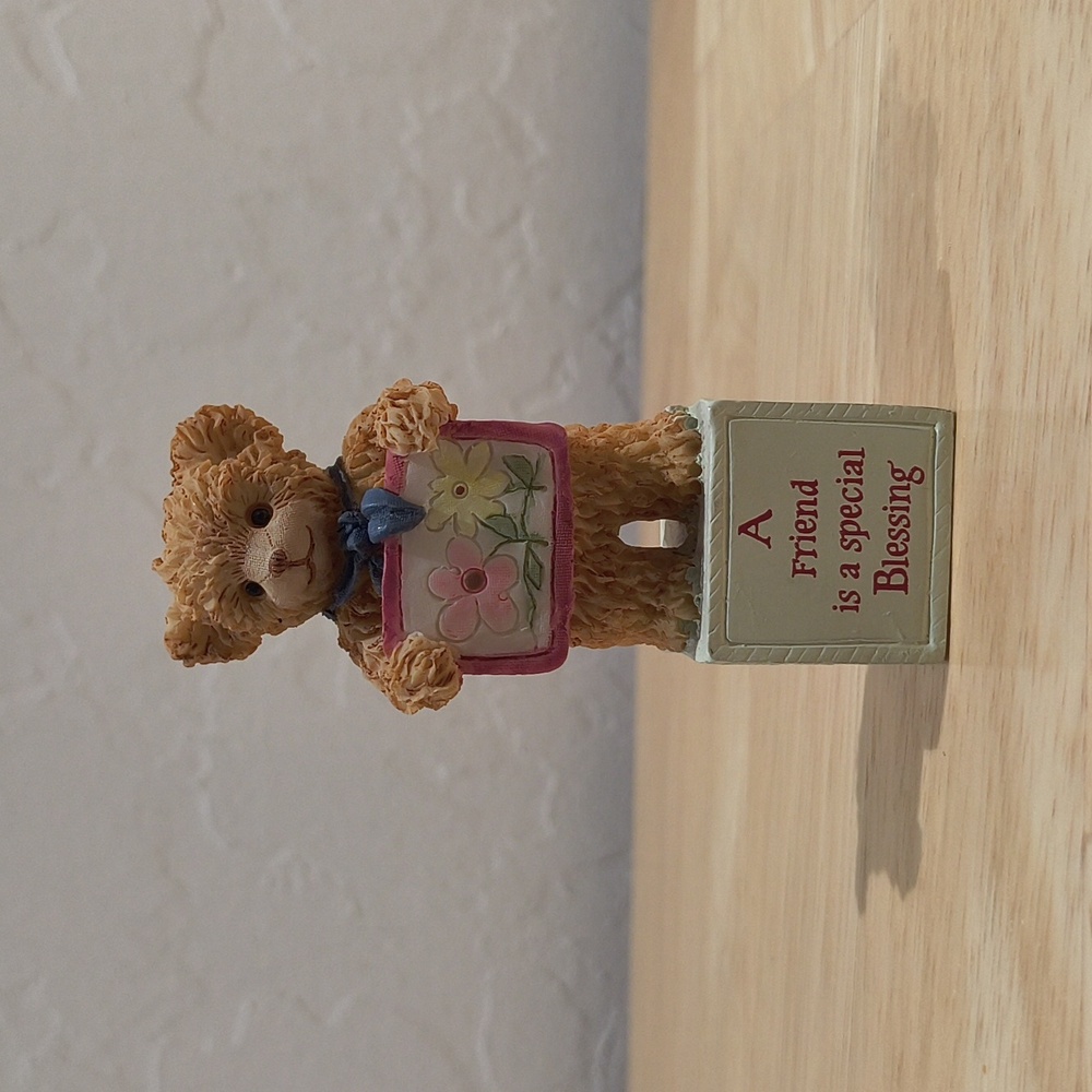 Cute Bainbridge Bear Figurine Holding Floral Sign